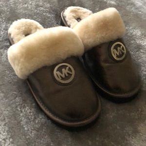 Michael Kors metallic slippers size 7. Never worn!